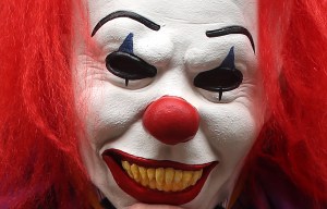 Killer clown 'dragged man off the street and brutally assaulted him as he was walking home'
