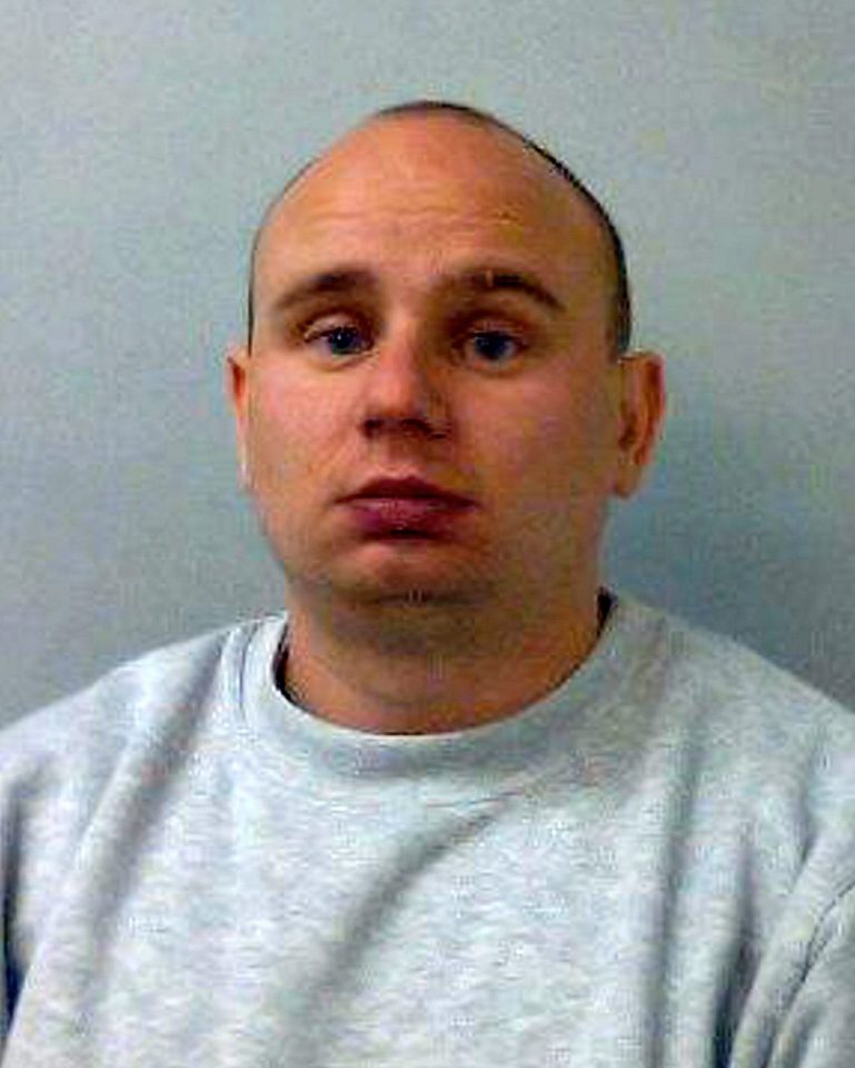 He was using his mobile phone to change music in the cab when he crashed into a line of vehicles, killing the family