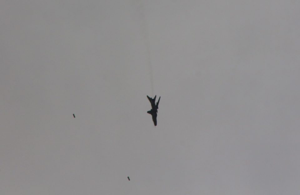 A fighter jet is seen over the skies of Damascus yesterday