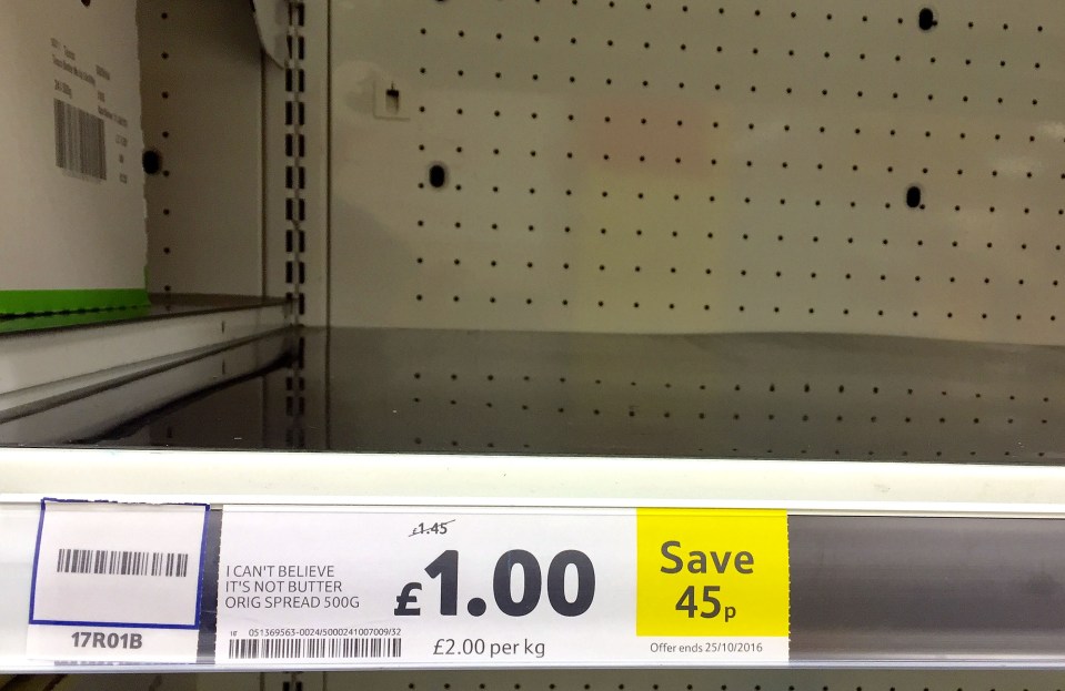 The shelves of a Tesco store in Royston, Hertfordshire are emptied of 'I can't believe it's not butter'