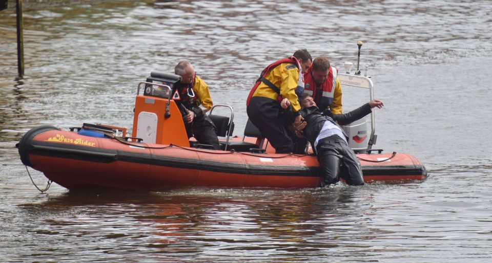 A rescue crew then dragged him from the river