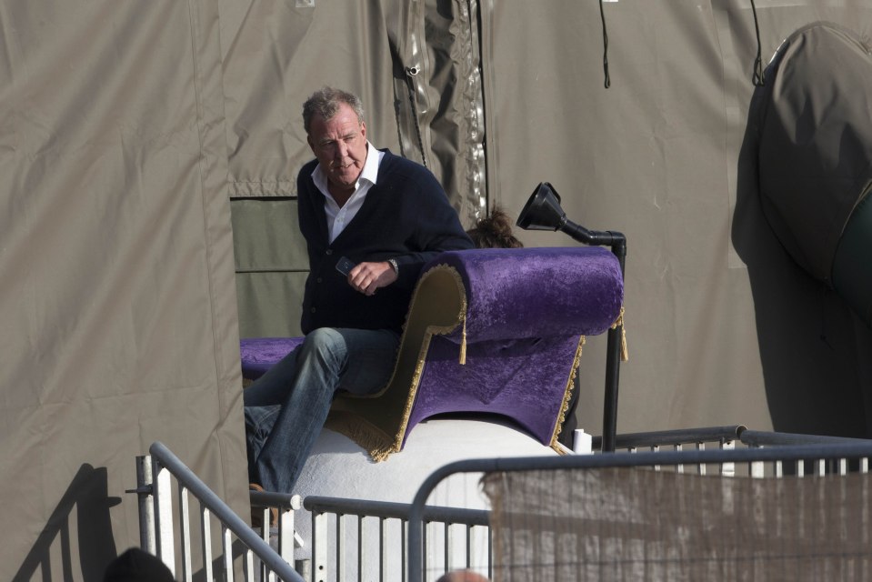 Other pictures showed Clarkson on a purple throne