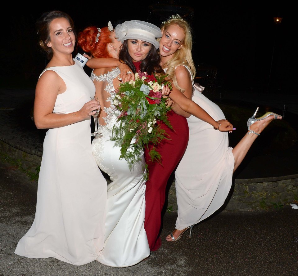 Charlotte paired her red dress with a quirky white headpiece