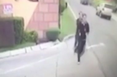 The mystery gunman was seen running up behind judge 