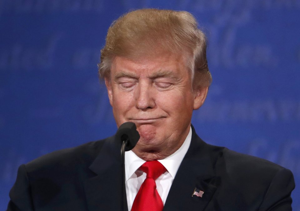 Republican U.S. presidential nominee Trump reacts during the third and final debate with Democratic nominee Clinton in Las Vegas