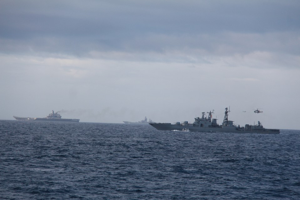 Dramatic images released by the Norwegian Navy showed Russian jets and helicopter and jets performing training sorties in the North Sea