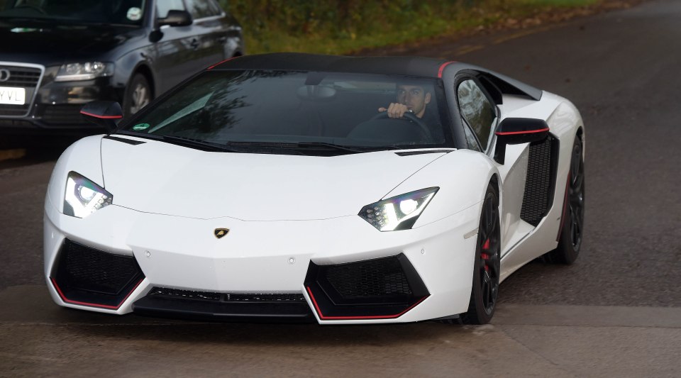 Henrikh Mkhitaryan arrives in his £260,000 Lamborghini
