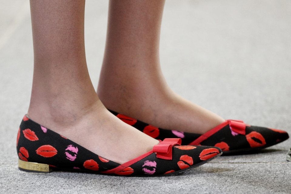 But the PM attempted to put her best foot forward in a pair of striking shoes