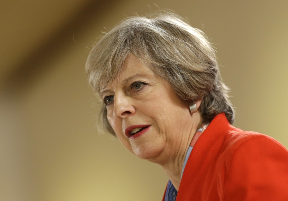 Theresa May signaled Friday that Britain is paving the way for trade talks with other countries well before it leaves the European Union but sought to reassure partners that this would not undermine the bloc's trade aims