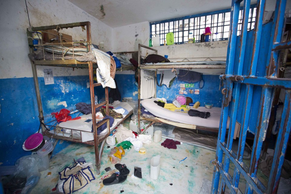 A prison cell is empty after inmates escaped from the Civil Prison in the coastal town of Arcahaiea
