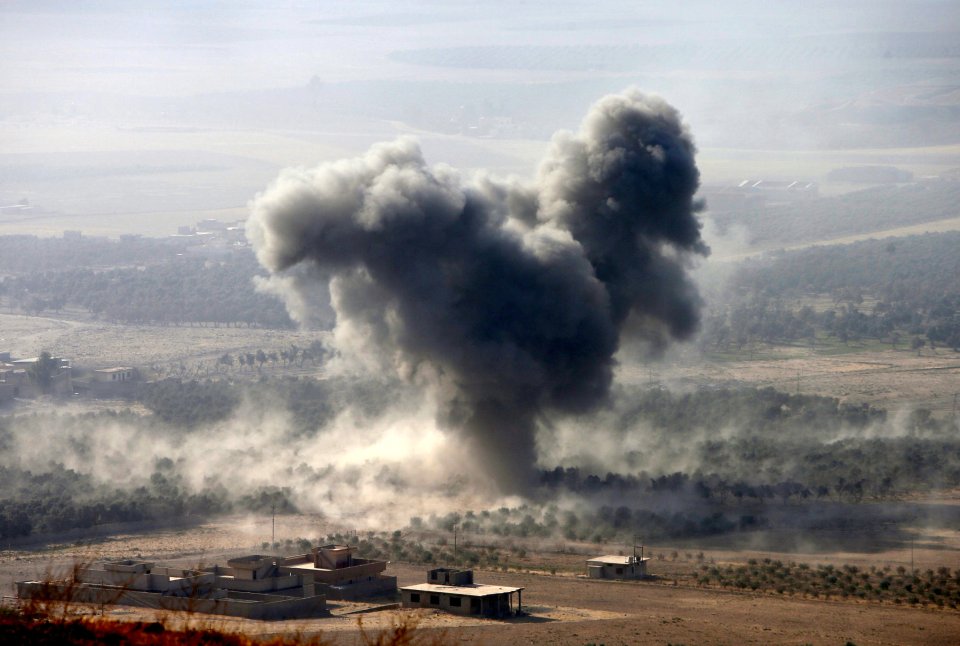 Smoke rises at Islamic State militants' positions in the town of Naweran, near Mosul, 