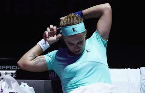 Russian tennis player Svetlana Kuznetsova cuts off her own ponytail mid-match before dramatic win