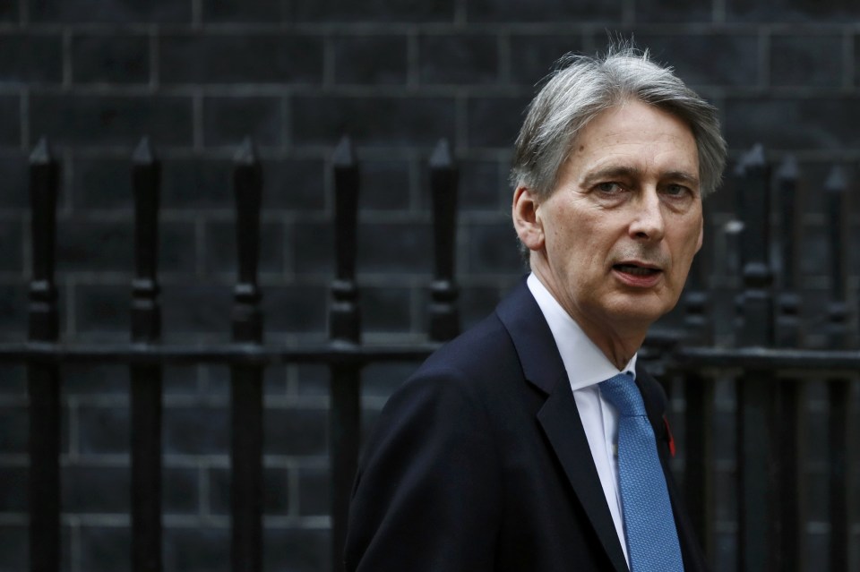 Britain's Chancellor Philip Hammond arrives at Downing Street in central London
