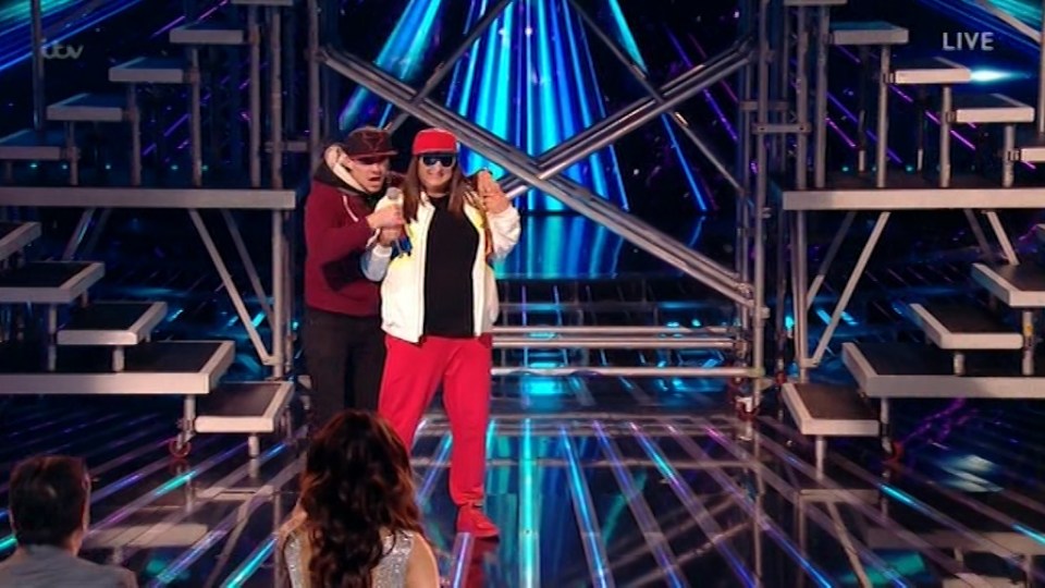 Five men stormed the stage after Honey G performed