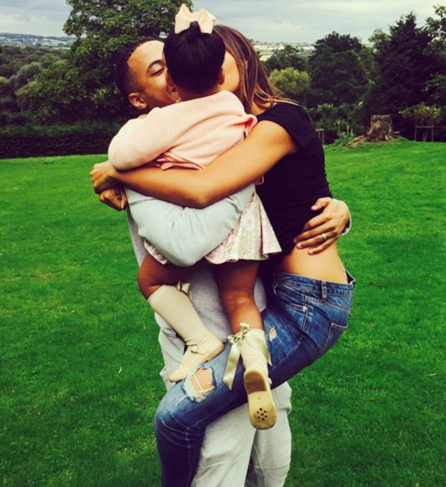 Rochelle and Marvin cuddle up to little Alaia-Mai