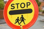 School crossing lollipop sign used by lollypop lady helping children cross the road safely. Image shot 2008. Exact date unknown.
