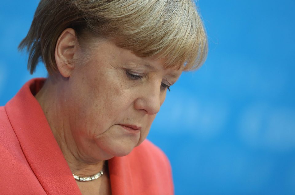 Angela Merkel has come under fire for her government's open door immigration policy 