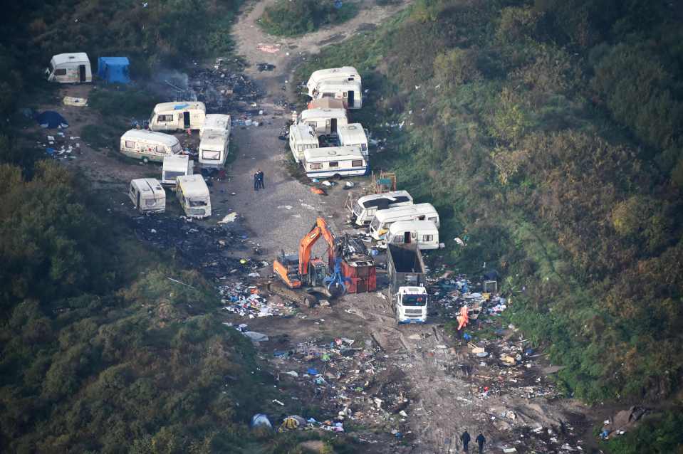 Debris field... Caravans lie smashed and abandoned 