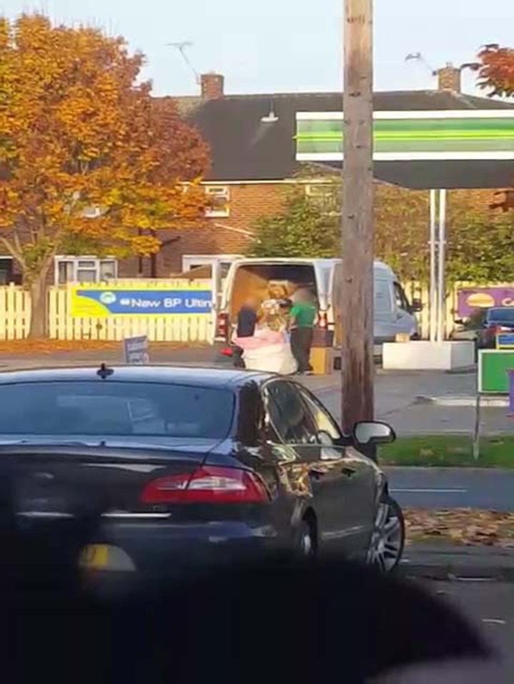 DELIVERY DRIVER CHUCKS PARCELS OVER FENCE