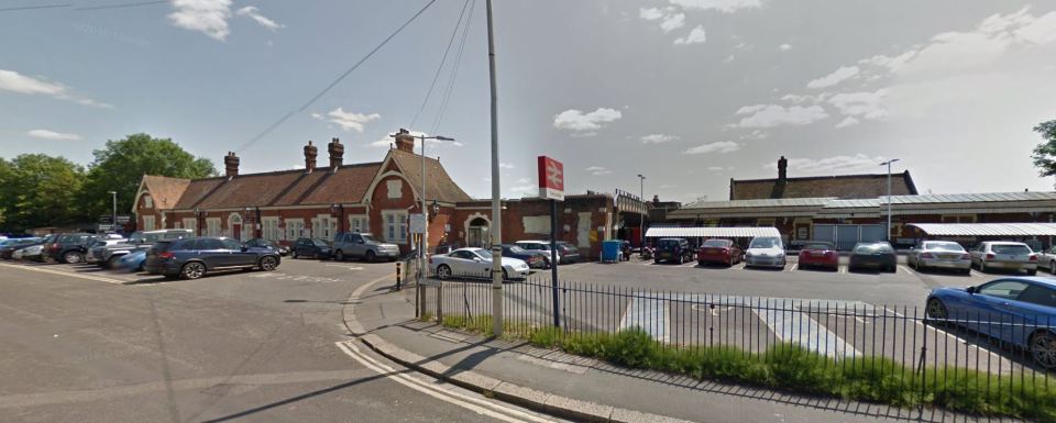 A Woman has been arrested on suspicion of attempted murder after a knife attack on a police officer at Farncombe Railway Station in Godalming, Surrey