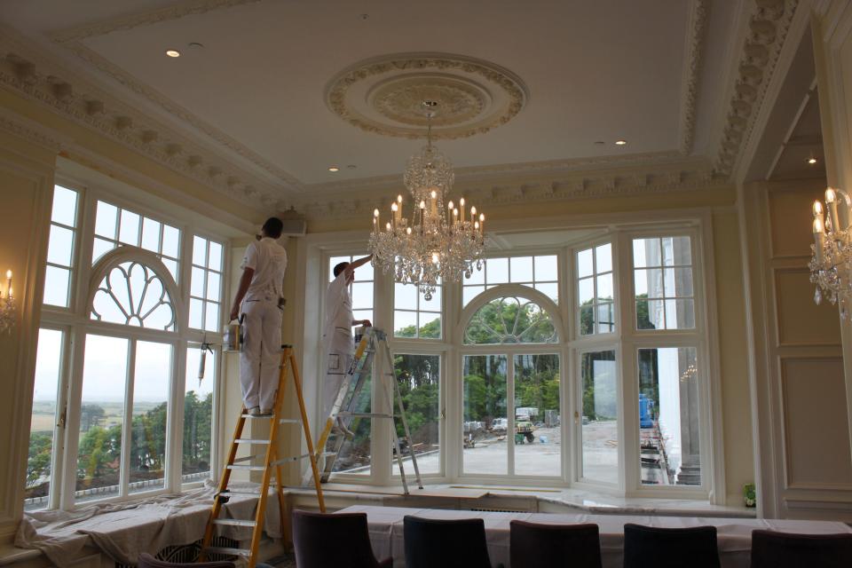 Decorators work in a dining room at the hotel of the Trump Turnberry golf resort 