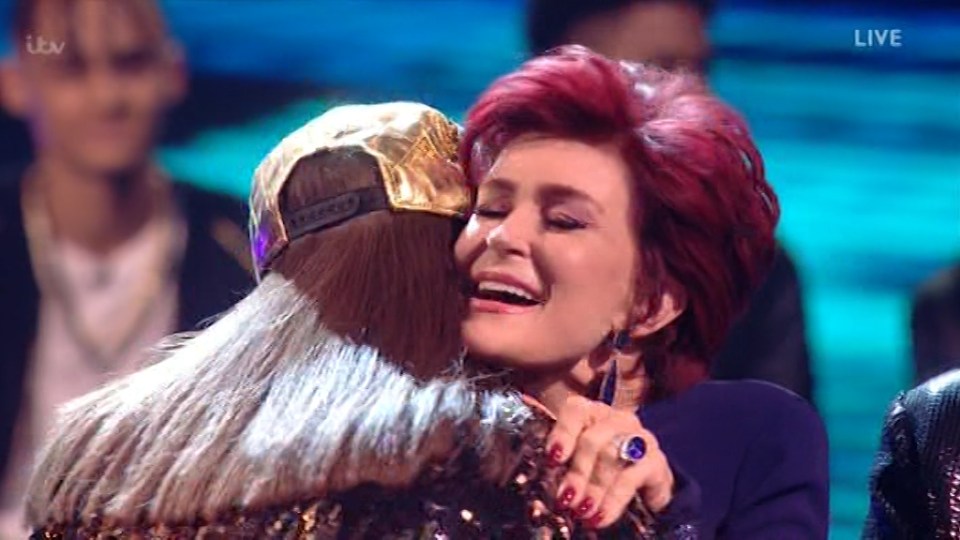 Honey hugged her mentor Sharon after hearing the good news