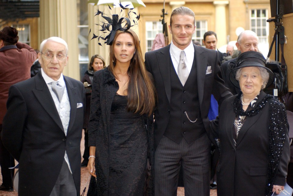  Victoria and David when he received his OBE at Buckingham Palace in 2003