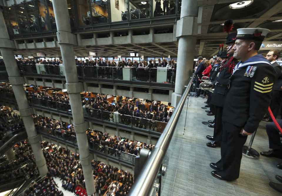 Lloyd's of London staff hold their annual Armistice Day service at the Lloyd's building in the City of London