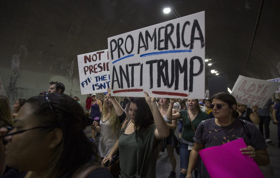 People turned out with signs and banners