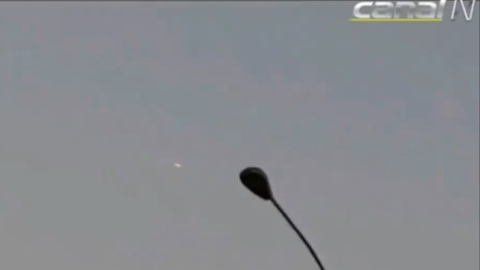 In the clip, a glowing ball of light can be seen flying through the dusky sky