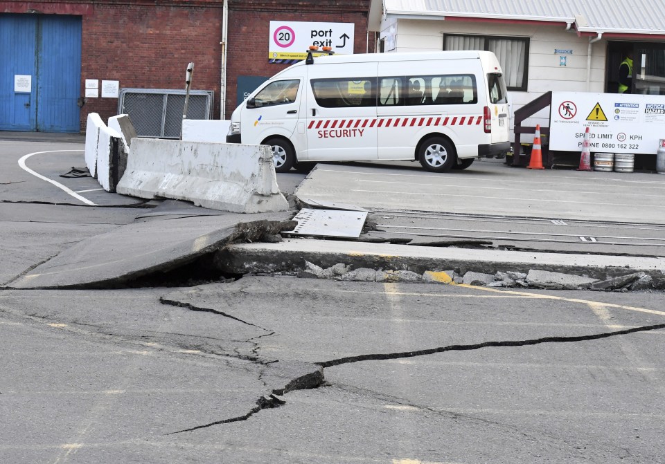Fissures run along a road by the Centre Port in Wellington on Monday morning