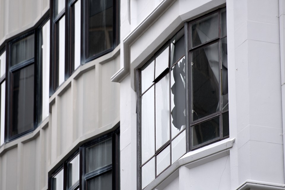 The glass of a window is broken in Wellington after a 7.8 earthquake struck the South Island 