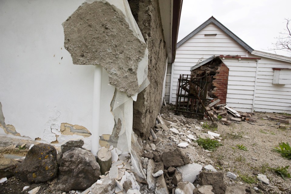 The walls of a historic church are damaged in Waiau after a series of earthquakes in New Zealand 