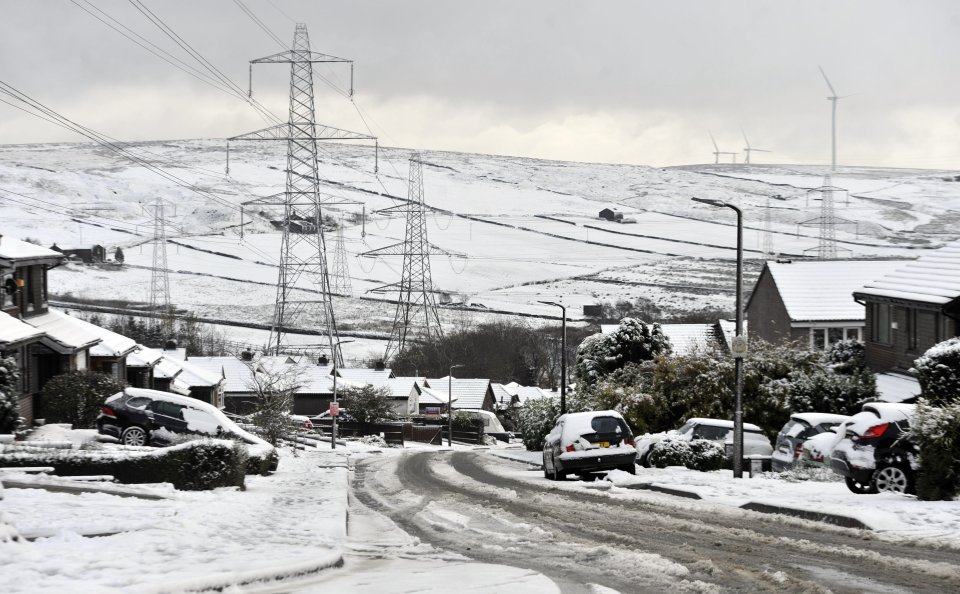 Heavy snowfall causes difficult driving condition for motorists in Bacup, Lancs., as the Lancashire town is covered in snow