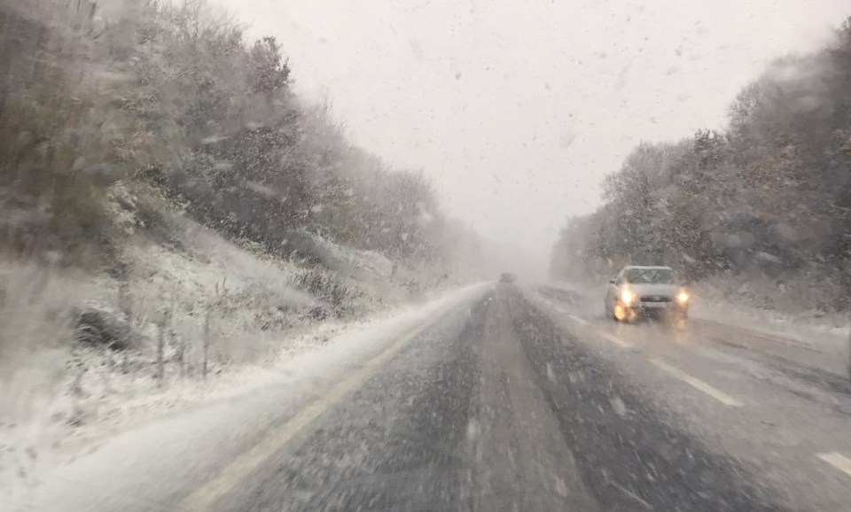 Snow fall makes for difficult driving conditions on the A361 near South Molton in Devon