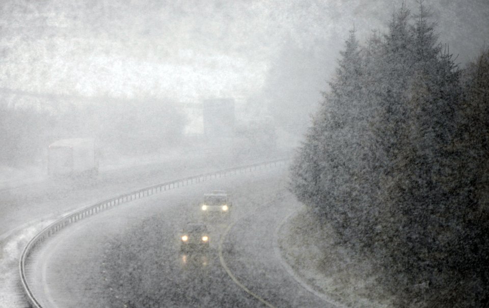 Heavy snow fell on the M74 near Abington, South Lanarkshire, Scotland.