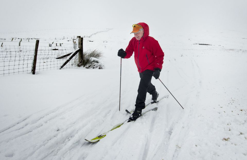 A man on cross country skis near the Buttertubs Pass in the Yorkshire Dales National Park makes the best of the chilly weather