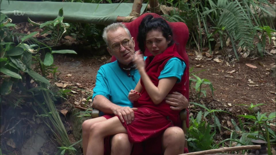 The star was comforted by Larry Lamb