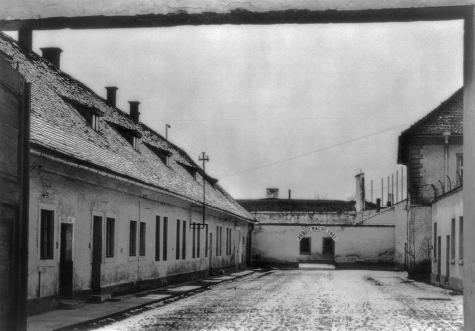 Theresienstadt concentration camp with sign 'Arbeit macht frei,' (Work makes you free). The slogan was placed over the