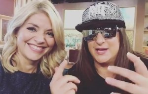 Holly admits her son, 2, can't speak but can say 'Honey G' as rapper records video for them