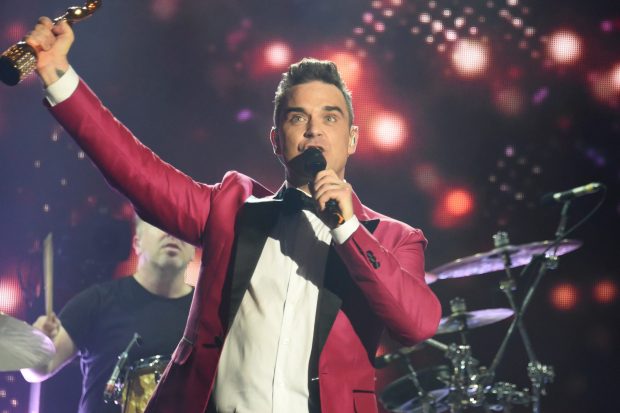 This week Robbie Williams becomes the third artist after Elton John and David Bowie to be named a BRIT Icon