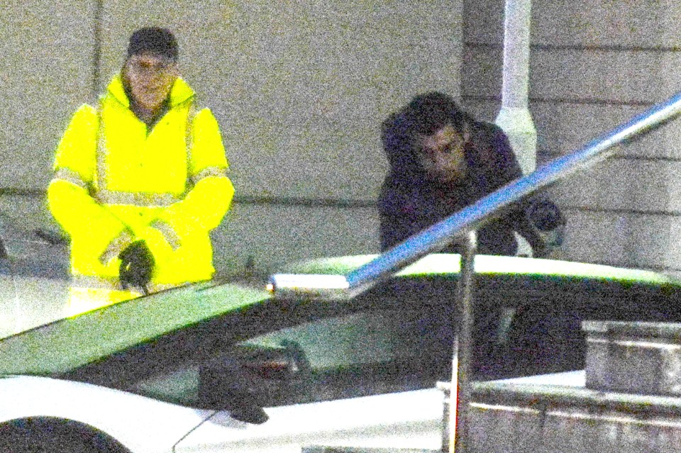 The Armenian is seen approaching his snazzy car at the Lowry Hotel