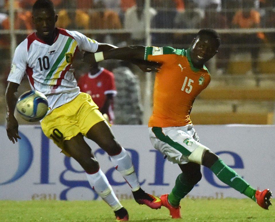 Max Gradel (right) fights for the ball with Mali's Modibo Maiga