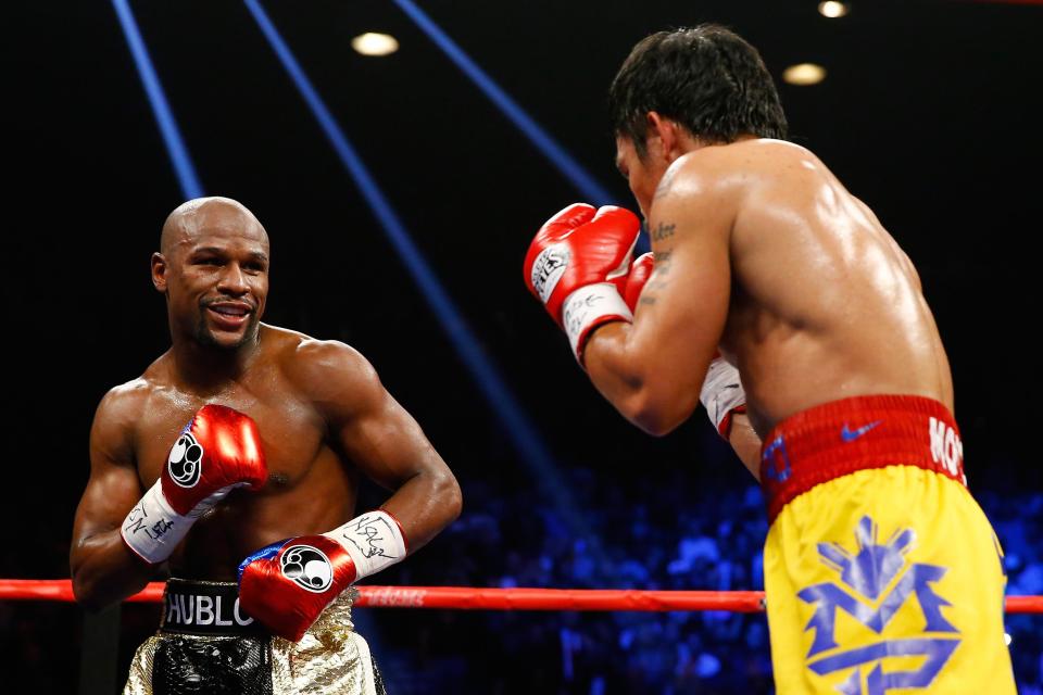 Floyd Mayweather, pictured here when he defeated Manny Pacquiao, would KO Conor McGregor in one round, says boxer Adrien Broner