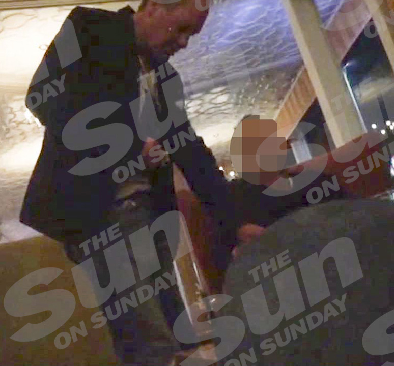 Gazza chats to fellow guest and tries to give him cash