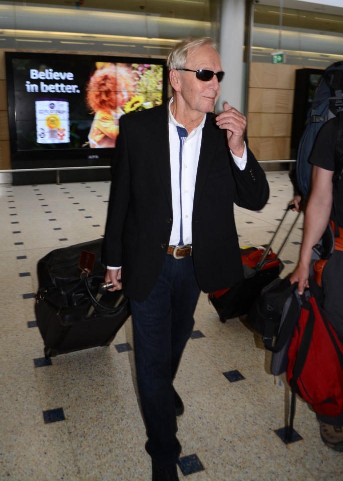 Paul Hogan was the epitome of 'smart casual' as he arrived at Sydney airport