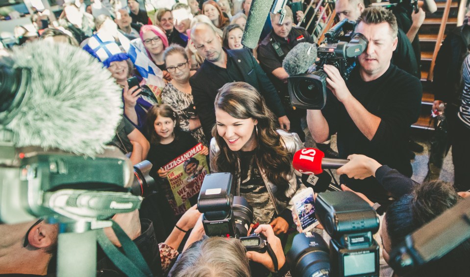 She was bombarded with questions from fans and the Finnish media moments after stepping off the plane