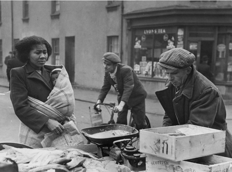 22nd April 1950: An ethnic mix of Arab, Somali, West African, West Indian and Greek families make up the population of the dockland area of Cardiff