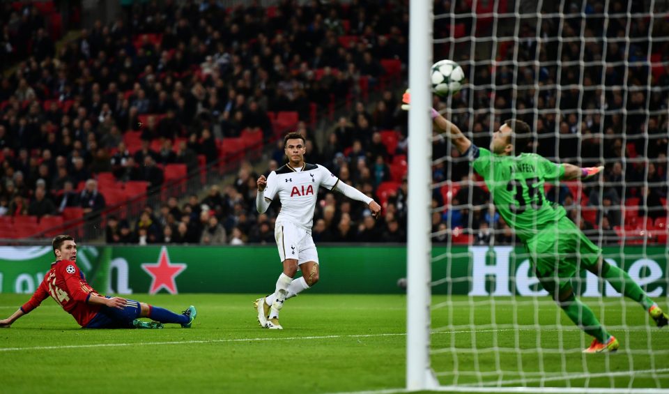 Dele Alli scores his sides first goal past Igor Akinfeev 