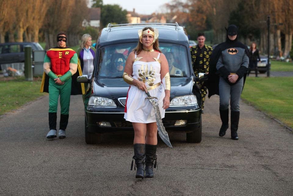 Co-op Funeralcare Funeral Director Cindi Gordon dressed as She-Ra leads the funeral cortege